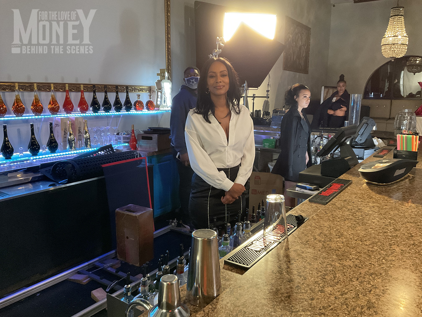 Black woman behind bar working